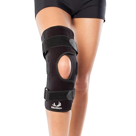 BioSkin Wraparound Hinged Knee Brace - Stays-in-Place Stability, Adjustable Compression Support for ACL/MCL, Meniscus & Arthritis, Lightweight Aluminum Side Hinges, Soft Breathable Hypoallergenic, Low-Profile (Small)